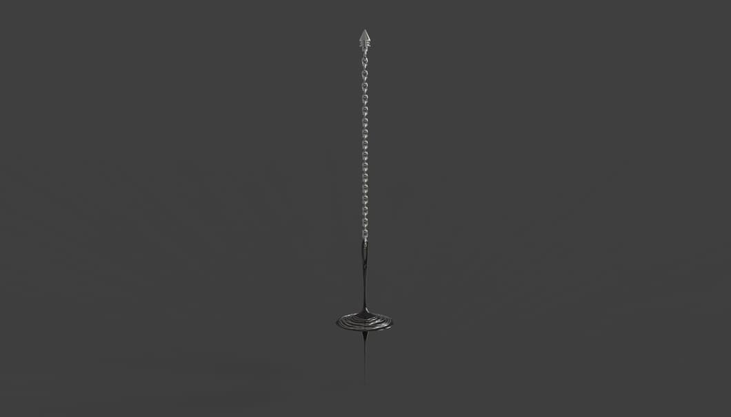 The top hanging as a pendulum on a silver chain