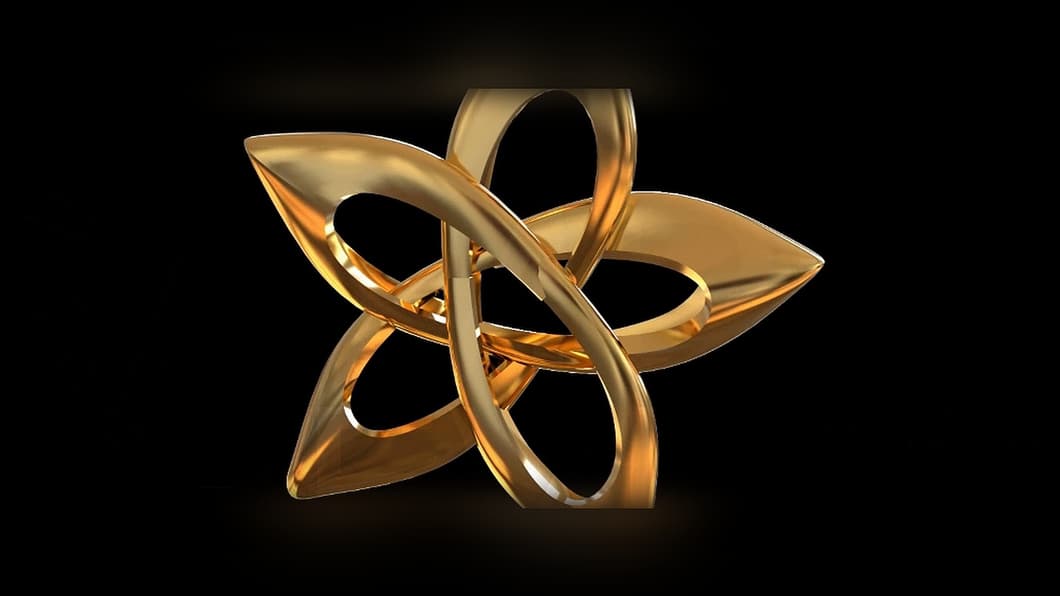 Close-up of the polished gold star pendant