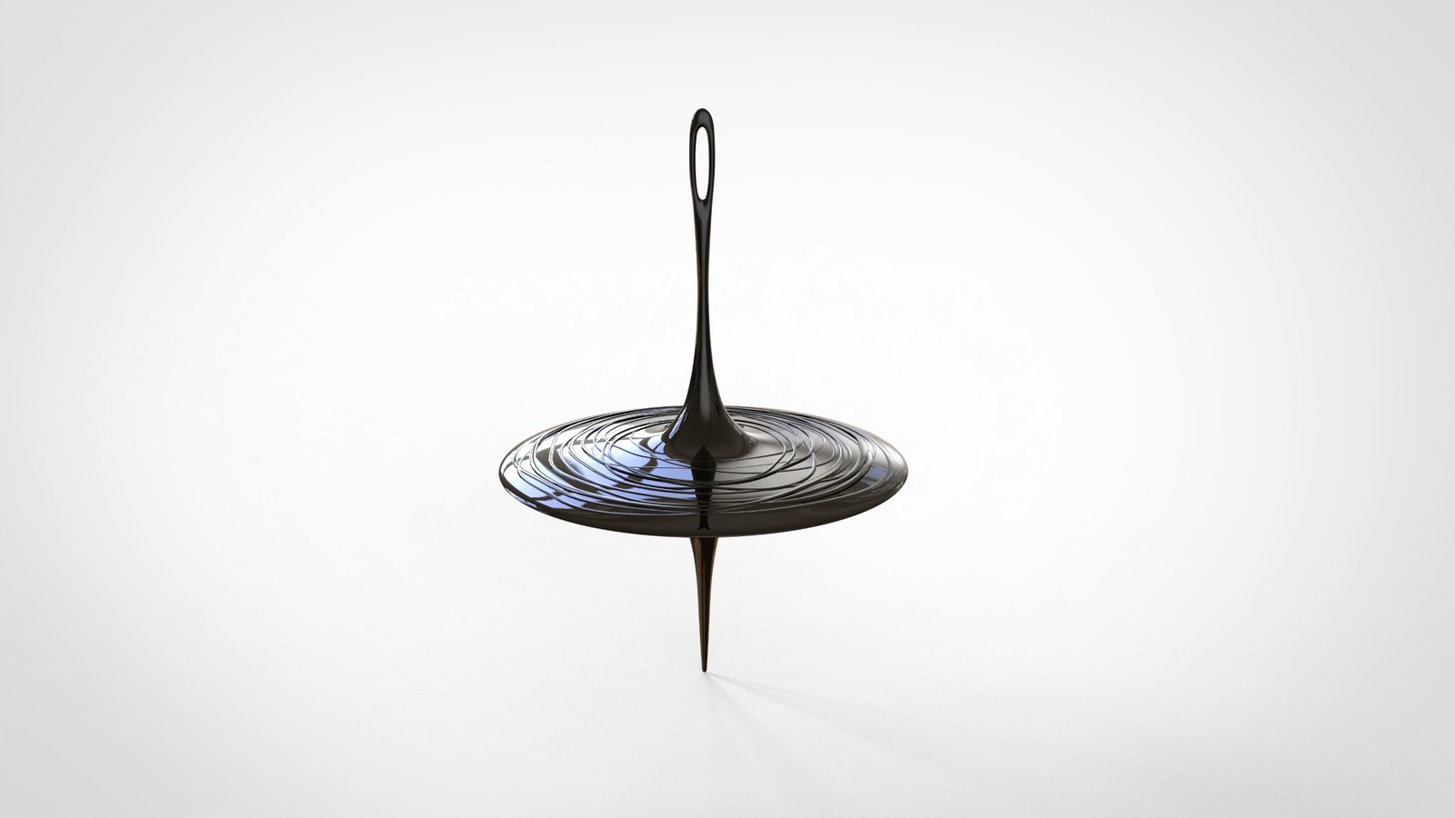 The spinning top in a white studio